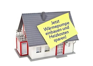 Wärmepumpe kaufen Post-it auf Modellhaus